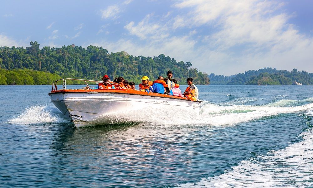 Share boat to lime stone cave.jpg