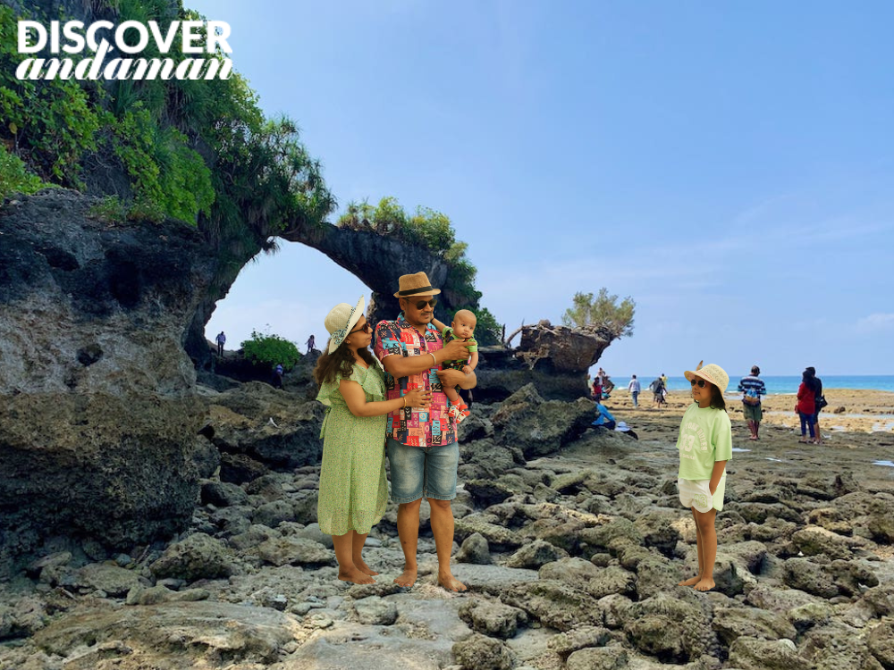 family clicks a pic with natural bridge